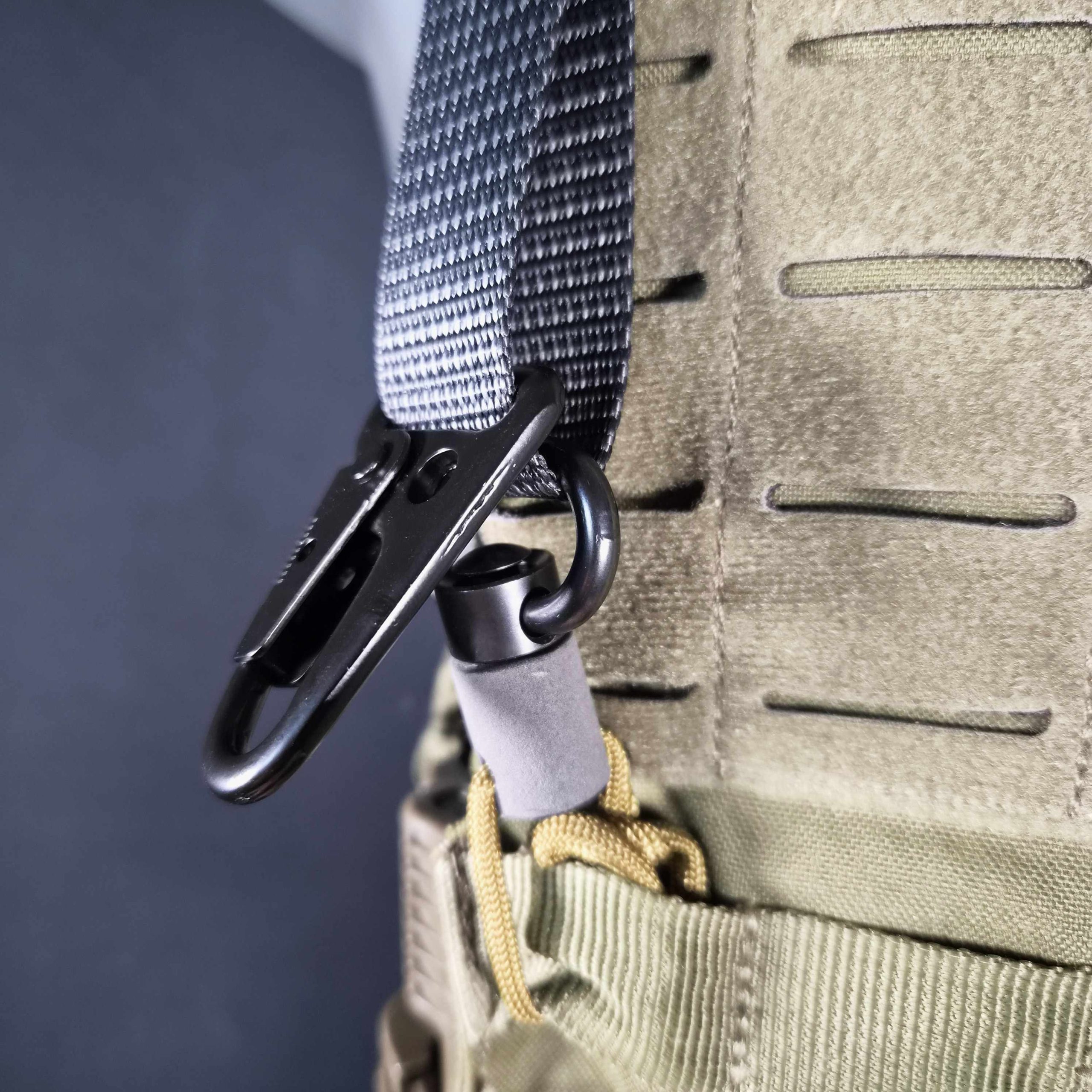 Two sling swivels on a plate carrier sling.